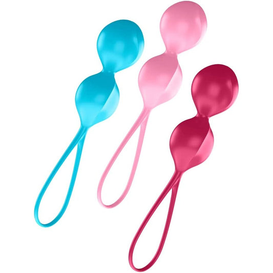 Three colorful spoons on a white background