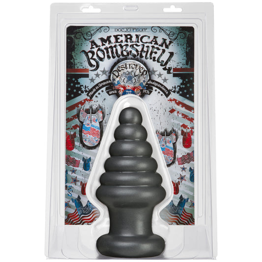 Black product in packaging with 'American Bombshell' branding on a white background