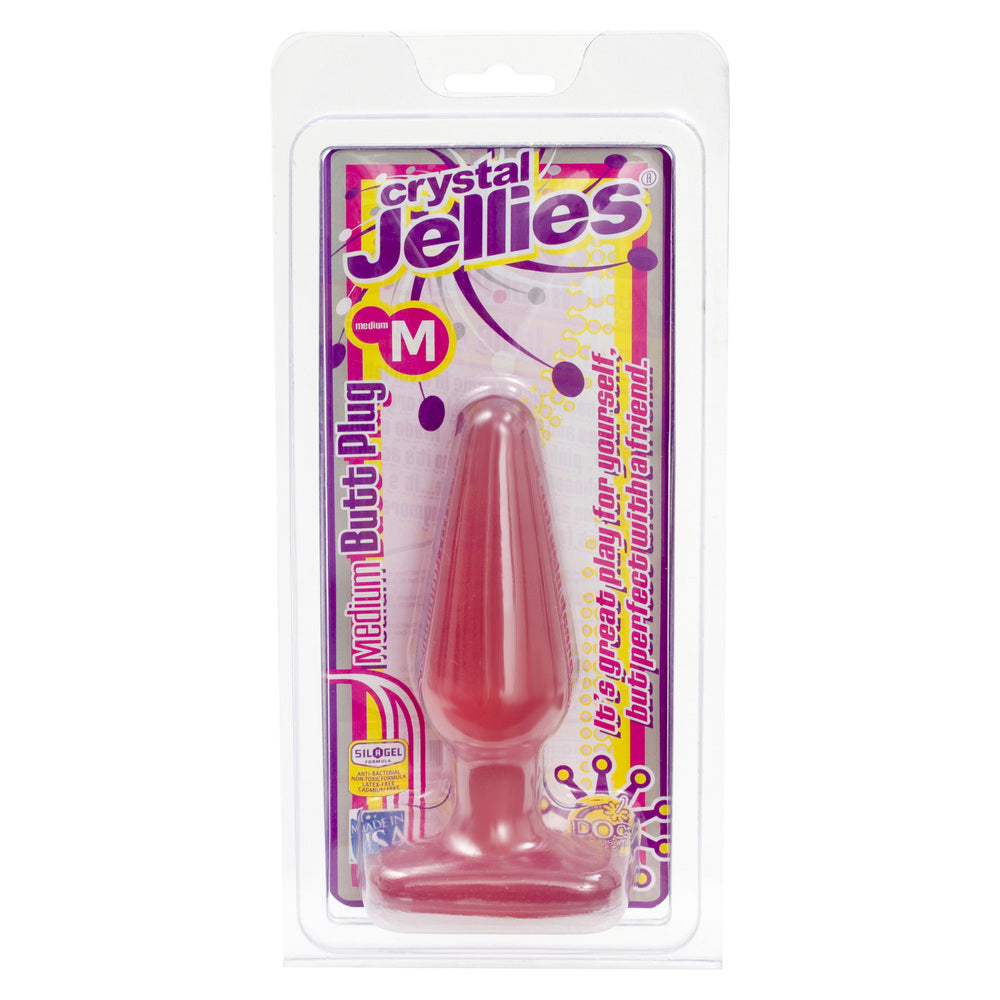 Pink medium butt plug in packaging with 'Crystal Jellies' branding on a white background