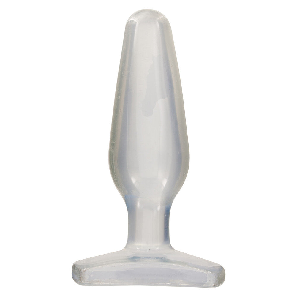 Clear silicone butt plug on a white background