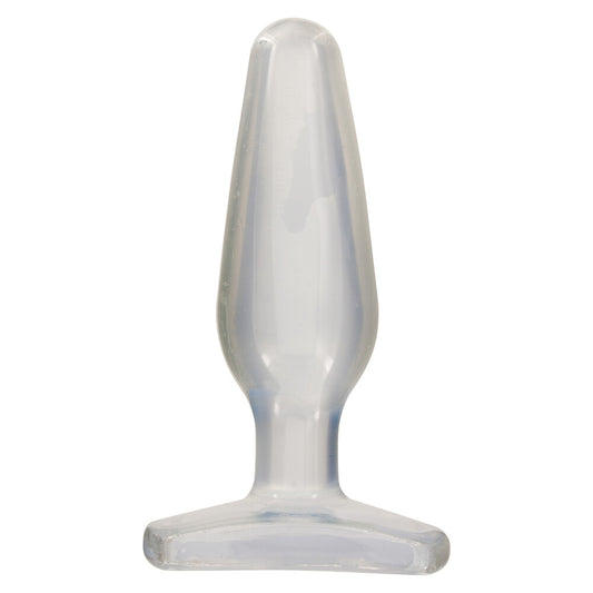 Clear silicone butt plug on a white background