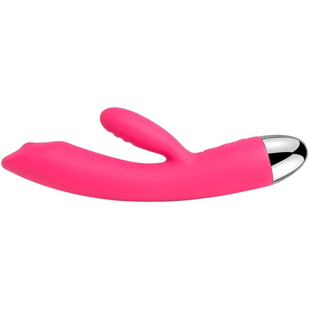 A bright pink, uniquely shaped vibrator with a smaller arm for clitoral stimulation and a rolling ball at the base for targeted stimulation. The device has a sleek, smooth surface with a shiny metallic tip.