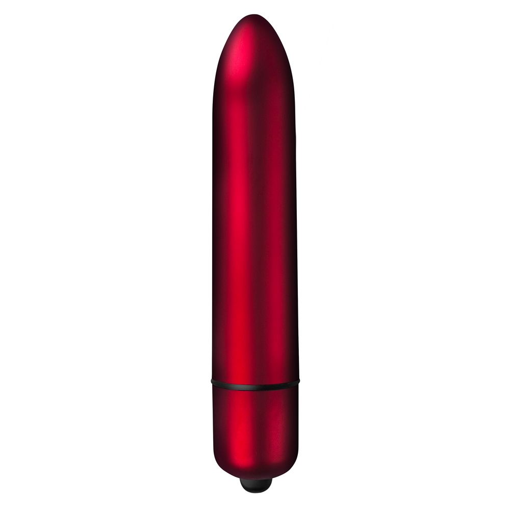 A red, bullet-shaped vibrator being held in a hand, showcasing its compact size and smooth surface.