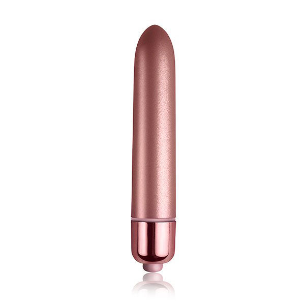 A pink, cylindrical vibrator with a smooth surface and a metallic base.
