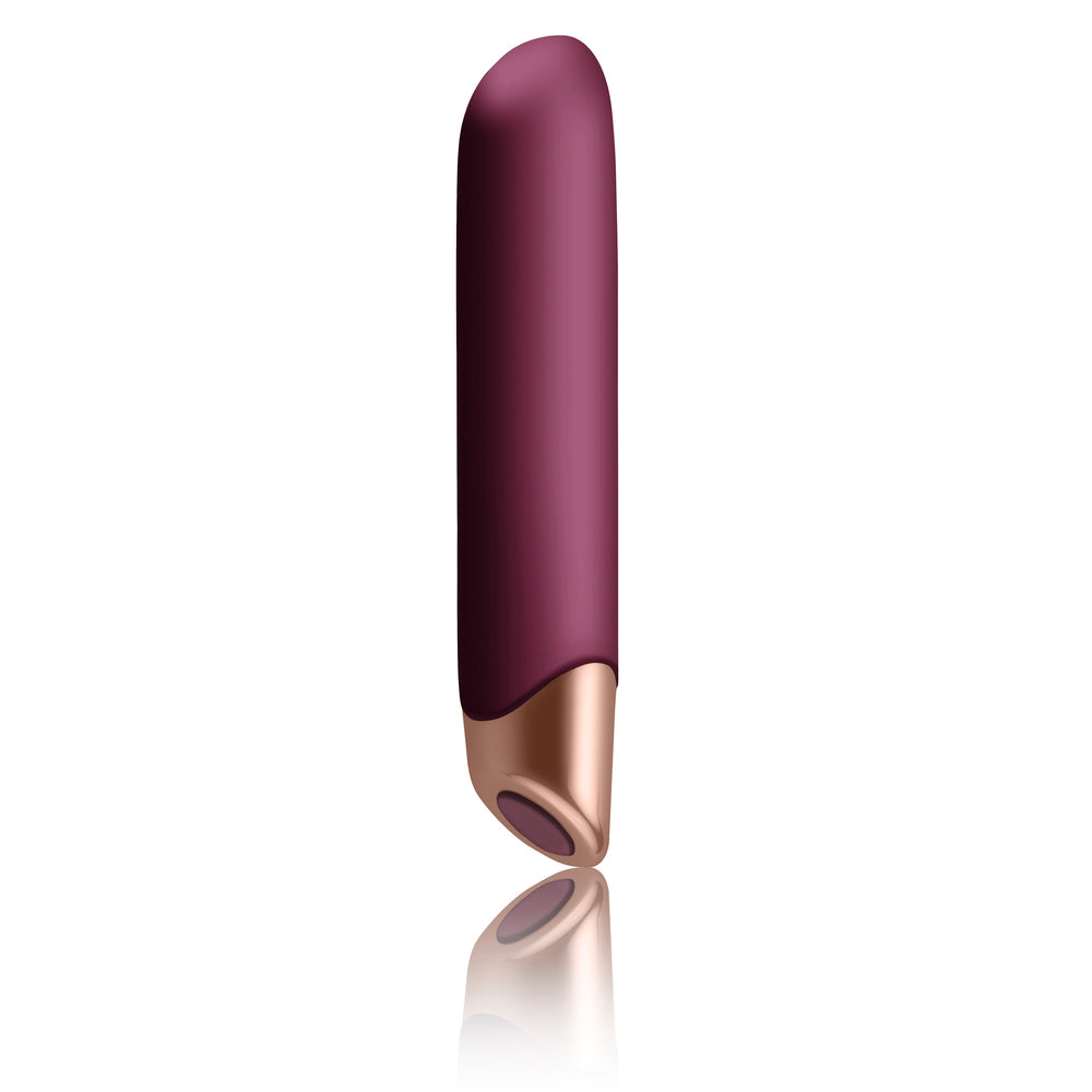 The image shows two maroon-colored silicone vibrators, one designed for vaginal insertion and the other for clitoral stimulation, along with their remote controls.