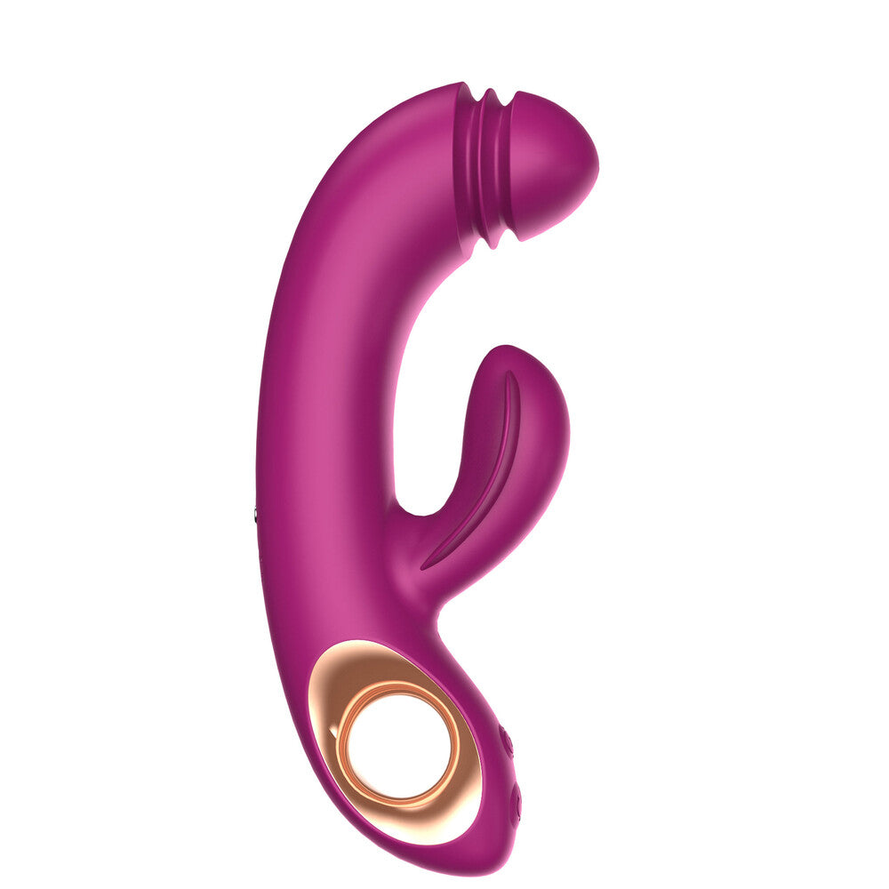 A purple and gold-colored dual-touch G-spot vibrator with a unique round shape and a small ring at the base for easy handling.