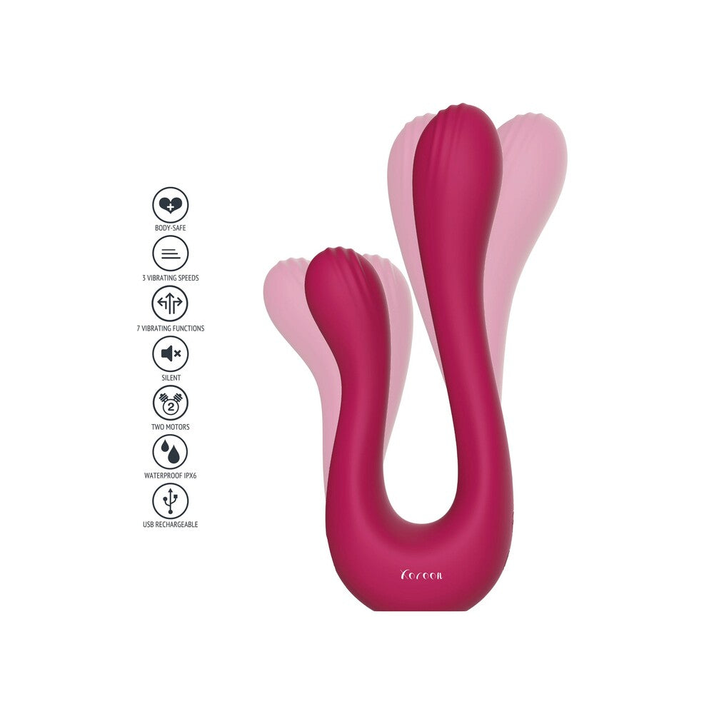 A pink, double-headed vibrator with a sleek, ergonomic design, featuring two curved ends for targeted stimulation.