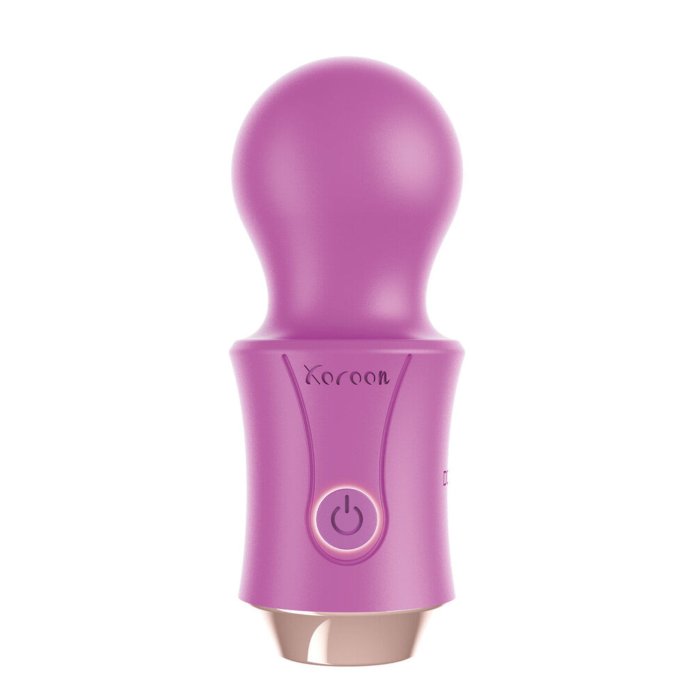 A purple, handheld wand massager with a rounded head and a built-in power button, branded XOCOON.