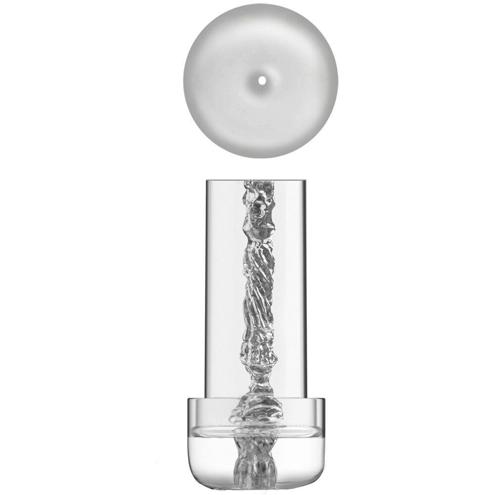 Clear glass container with a silver object inside on a white background