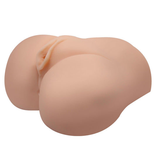 A flesh-pink masturbator designed to resemble a female lower body, with a smooth exterior and realistic details.