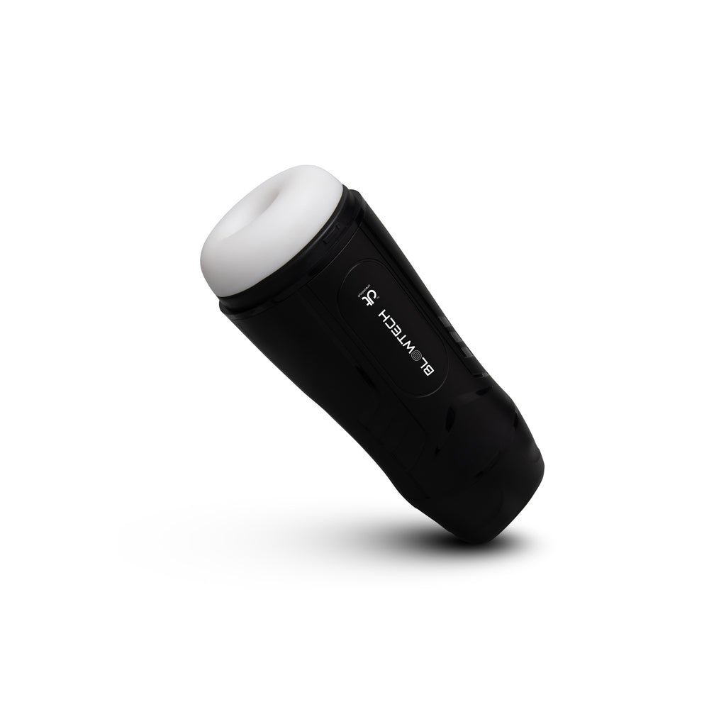 Black cylindrical device with white top on white background