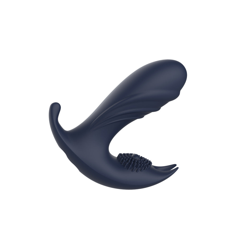 Navy blue silicone toy with textured end on a white background