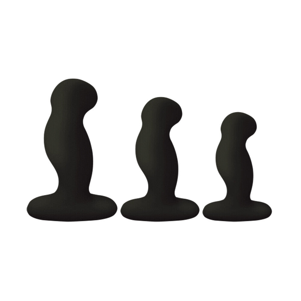 Three black silicone butt plugs of different sizes on a white background