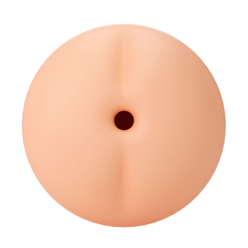 A flesh-pink, round silicone sleeve with a slight texture, designed for use with a sex toy.