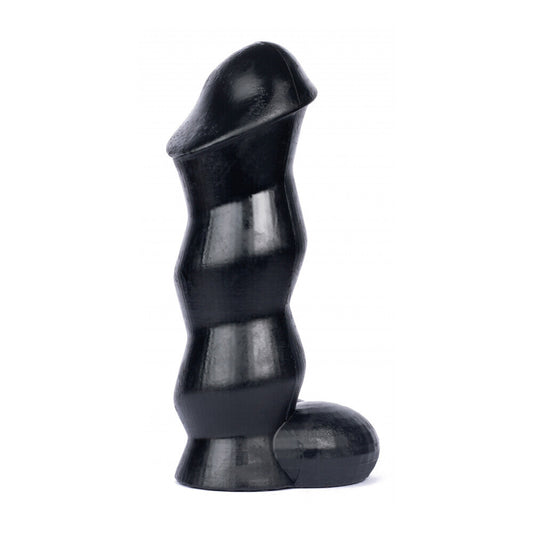 Black twisted plastic object on a white background