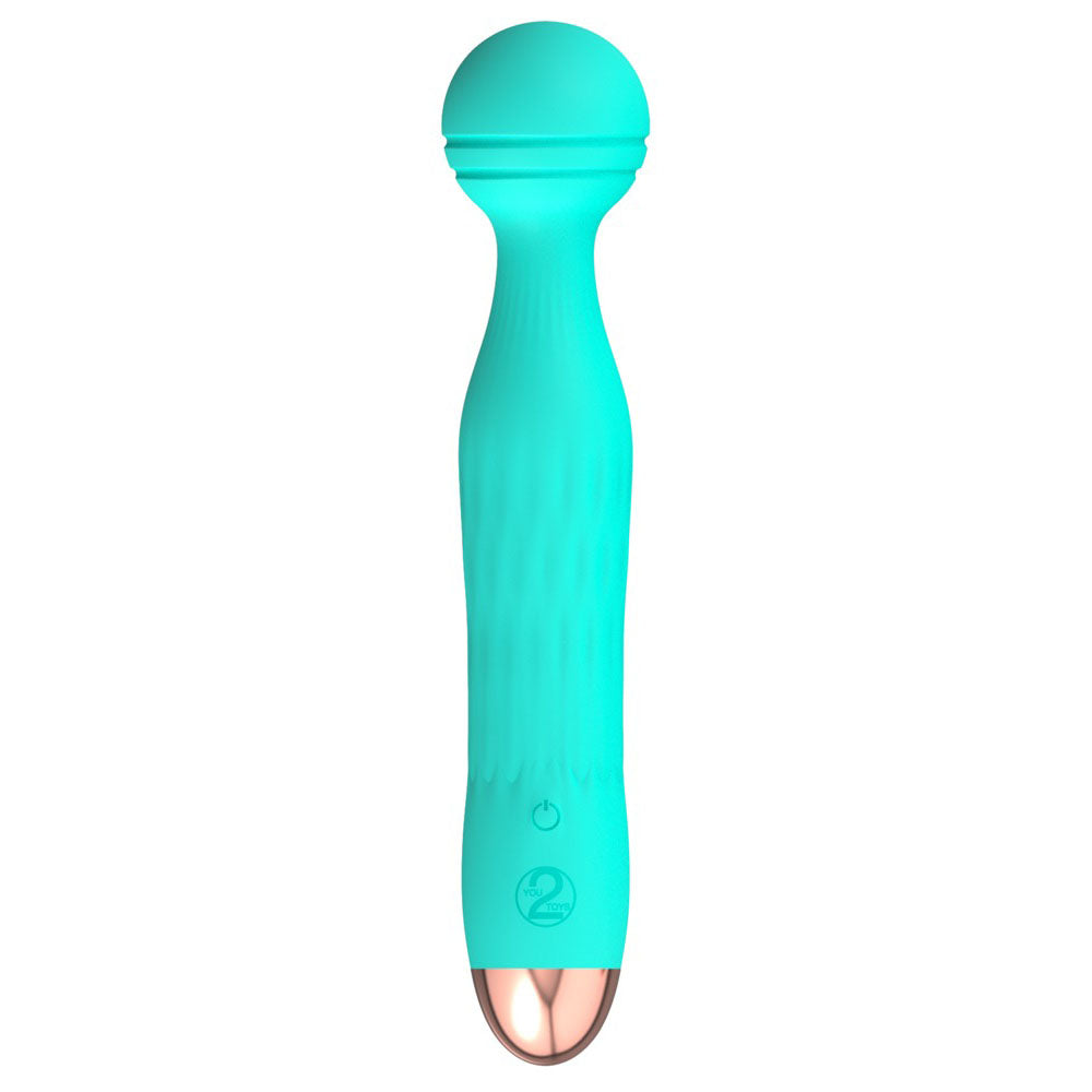 A small, green, silicone mini vibrator with a grooved texture on the head and a sleek handle, showing the brand's logo near the base.