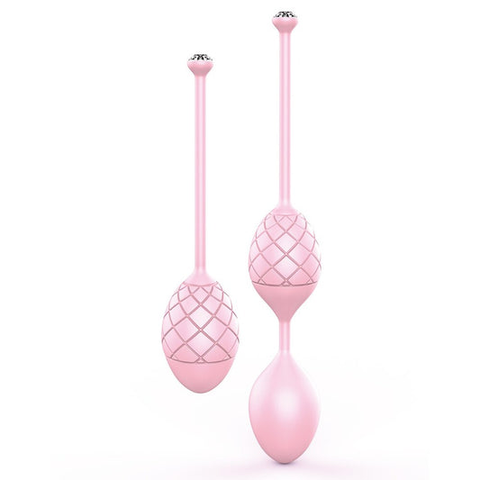 Two pink pleasure balls with a textured surface and a crystal-accented handle, designed for Kegel muscle exercise.