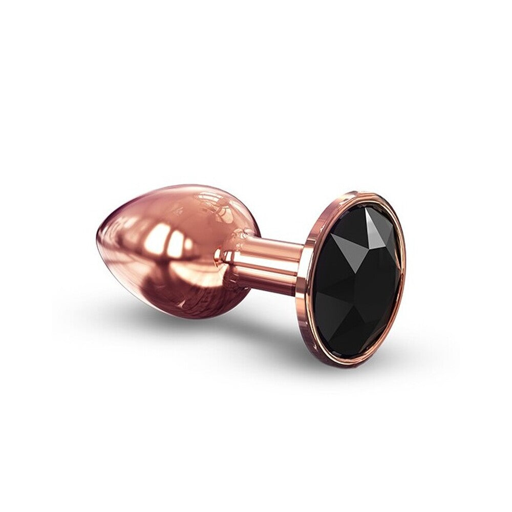Rose gold anal plug with black gem on a white background