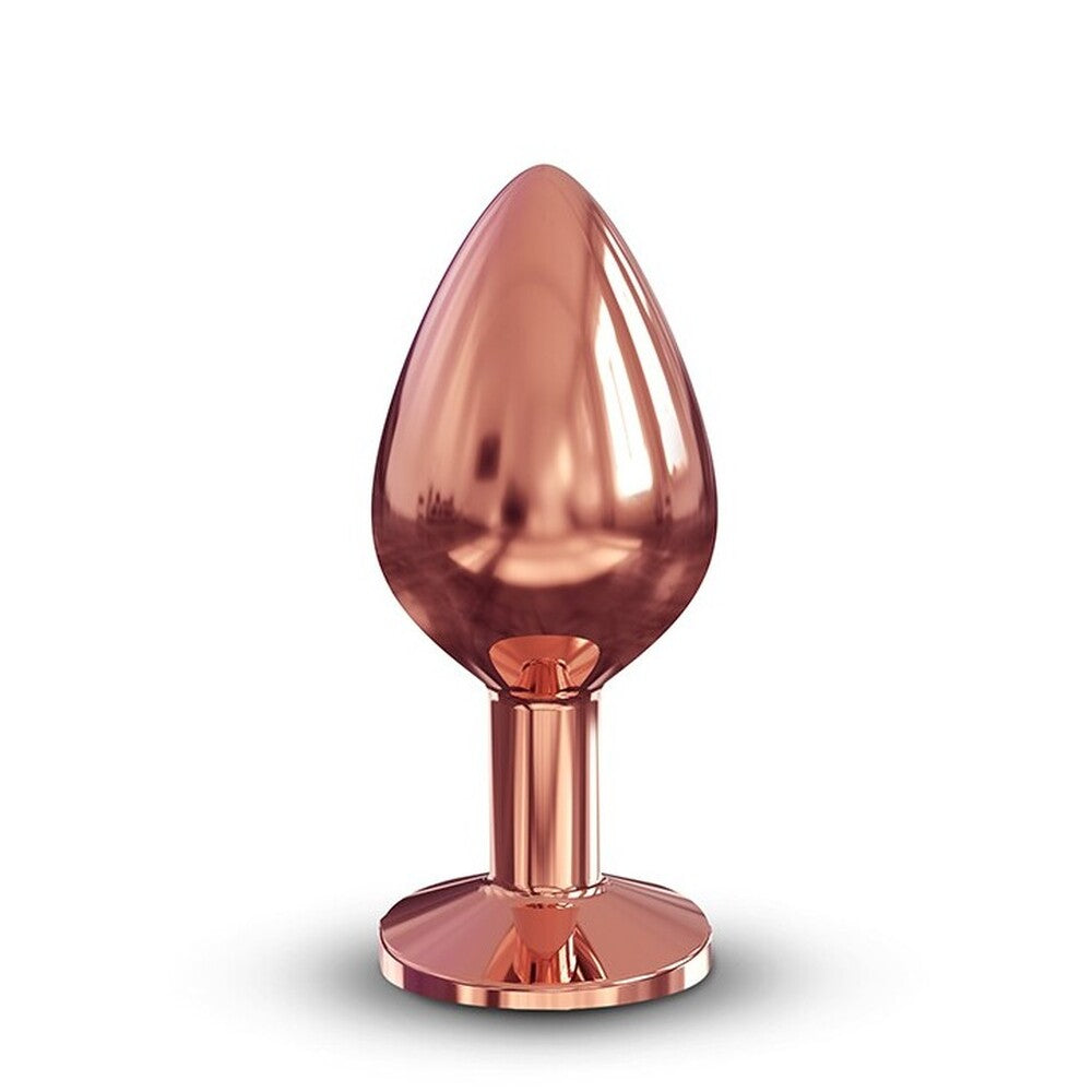 Rose gold butt plug on a white background
