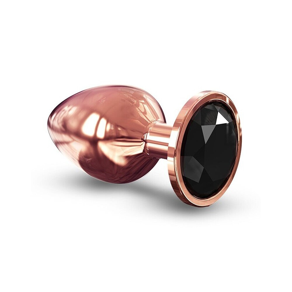 Rose gold anal plug with a black gemstone on a white background