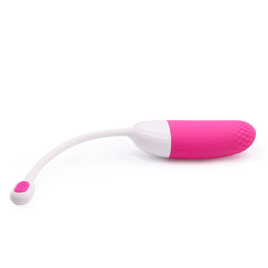 Pink and white personal care device on a white background
