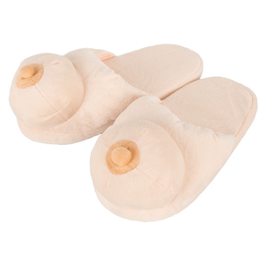 A pair of flesh pink boob-shaped slippers made from polyester.