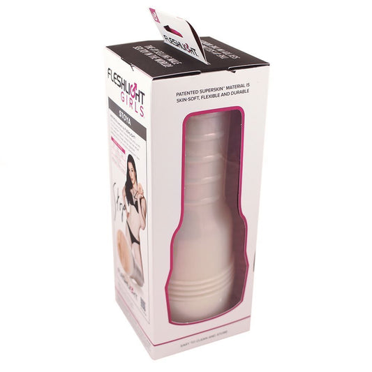 The image shows a product called the Stoya Destroya Fleshlight Girls Masturbator, which is a cylindrical device with a realistic flesh pink texture. There is also a photo of a woman in a black bikini, presumably the person whose body the product was modeled after.
