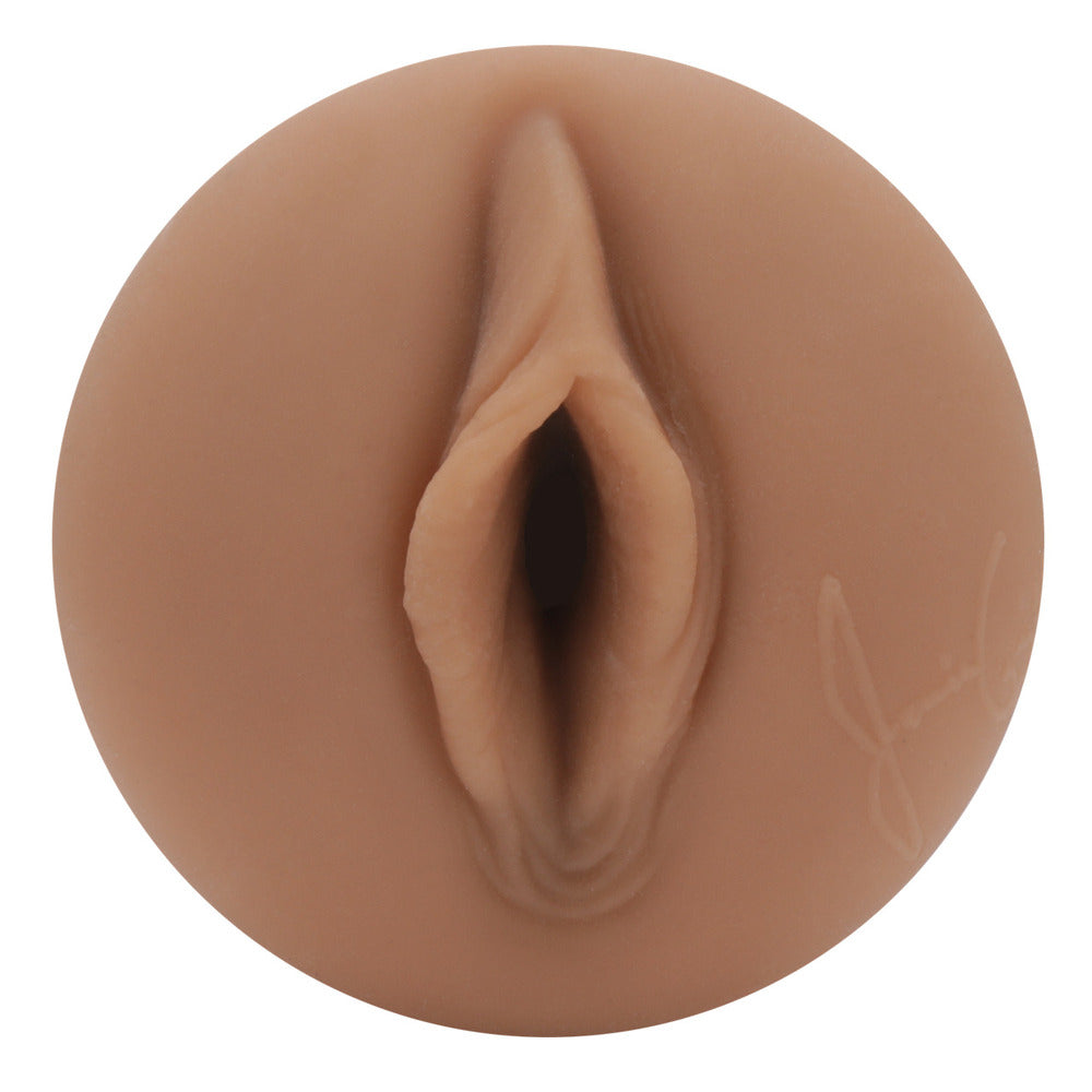 The image shows a white masturbator designed to resemble the intimate parts of an adult film star, in this case, Janice Griffith. The product has a realistic flesh brown color and features a detailed internal texture.