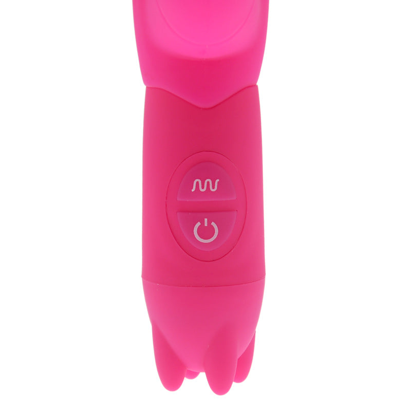 A pink Joy Rabbit Vibrator with a slender shaft and a realistic tip. It has a rabbit-style clitoral stimulator with soft, fluttering ears and control buttons on the base.