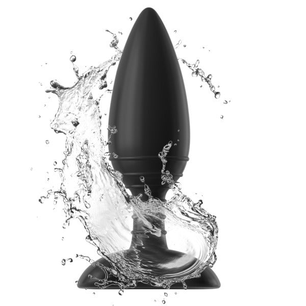 A black, large-sized vibrating butt plug made from silicone, shown with water splashing around it, indicating its waterproof feature.