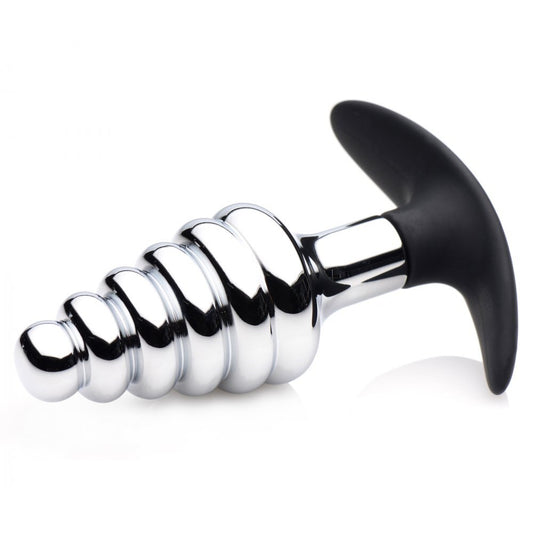 Metallic and black screw-shaped object on a white background