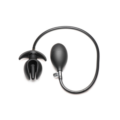 Black neck massager with a cable on a white background