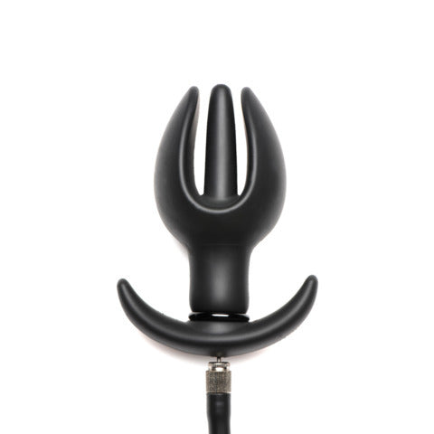 Black plastic tool with a cord on a white background