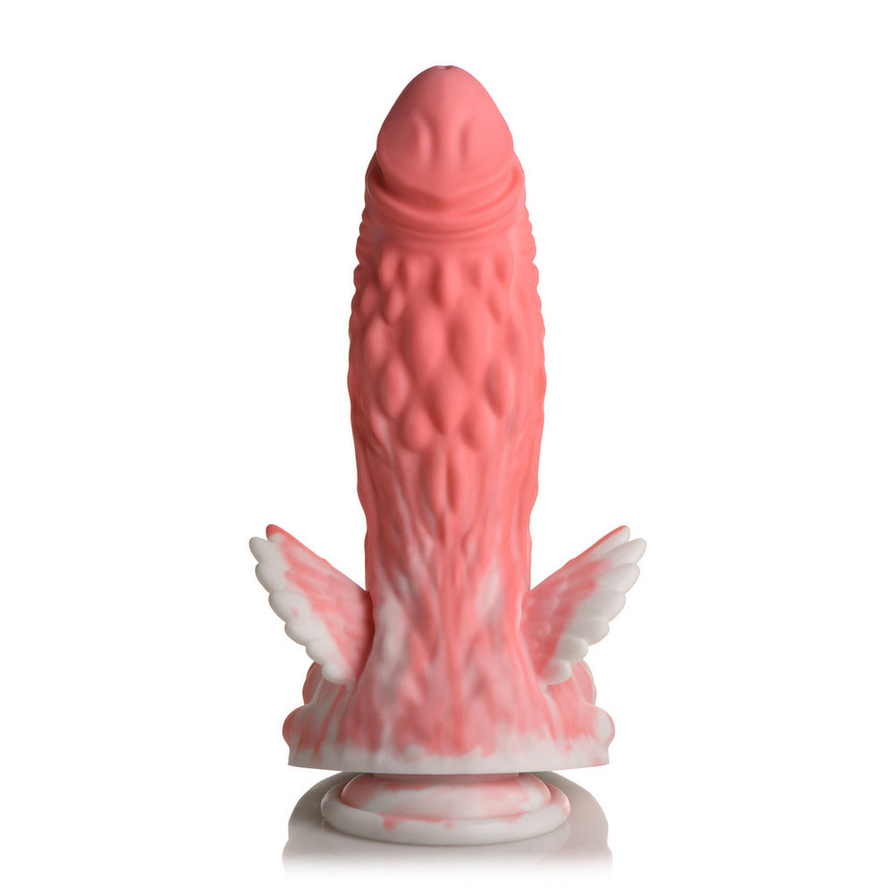 Pink silicone product with textured surface and white base on a white background