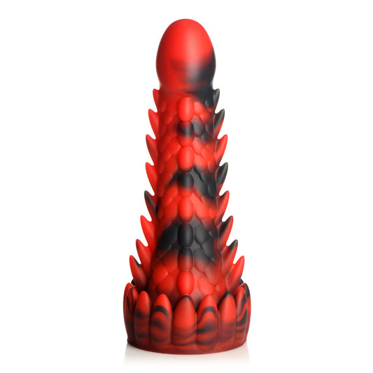 Red and black spiked cylindrical object on a white background