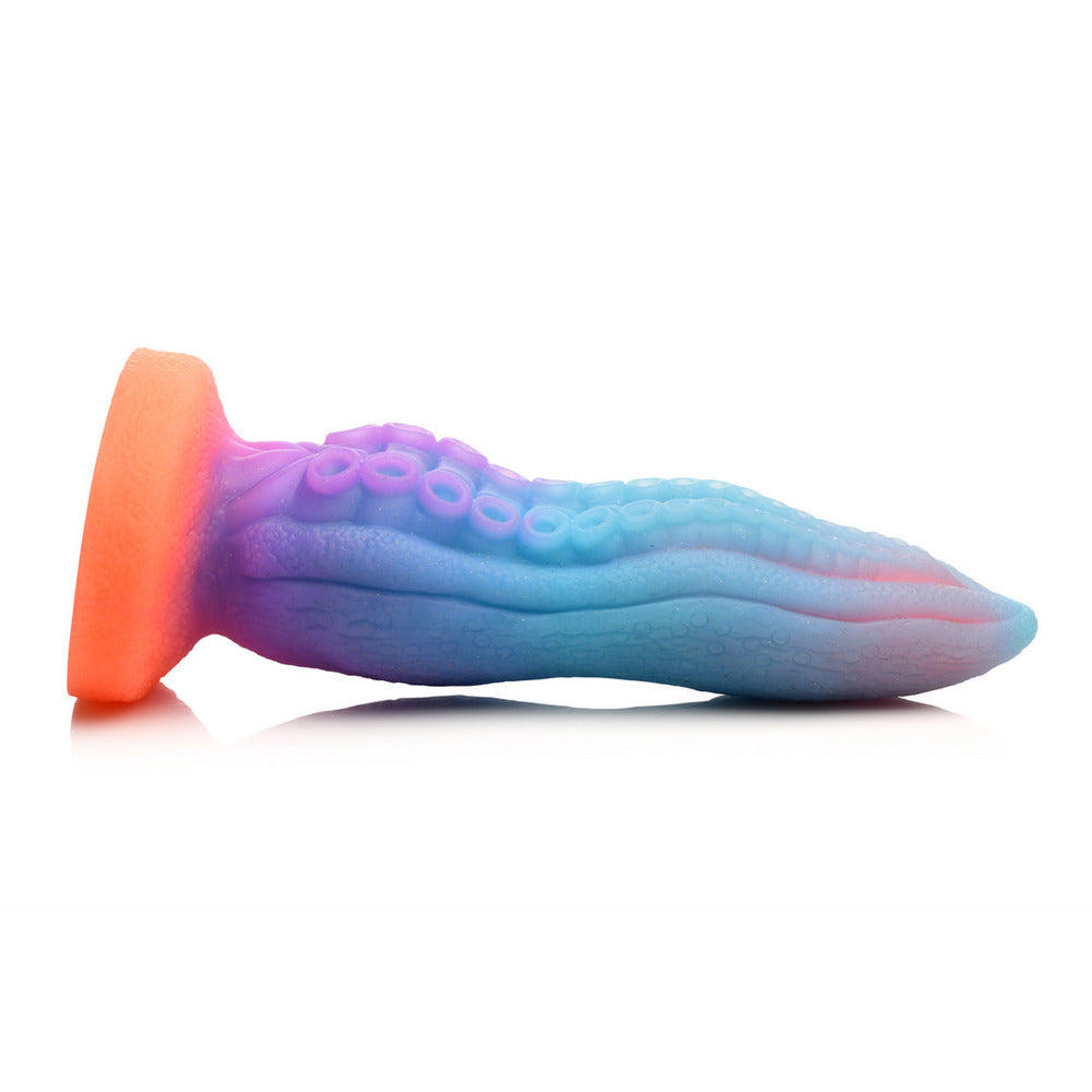 Colorful silicone butt plug on a white background