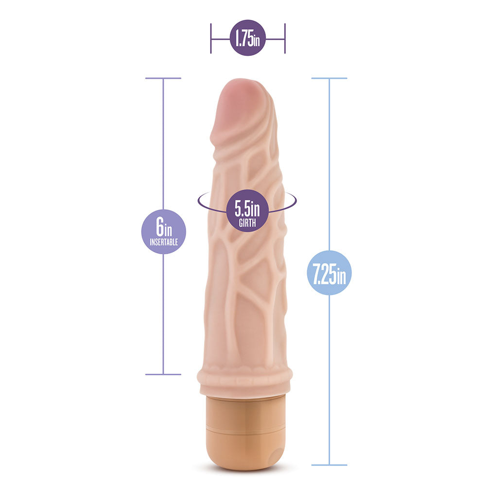A flesh-colored, realistic vibrator with a twist dial base, featuring veins along its length.