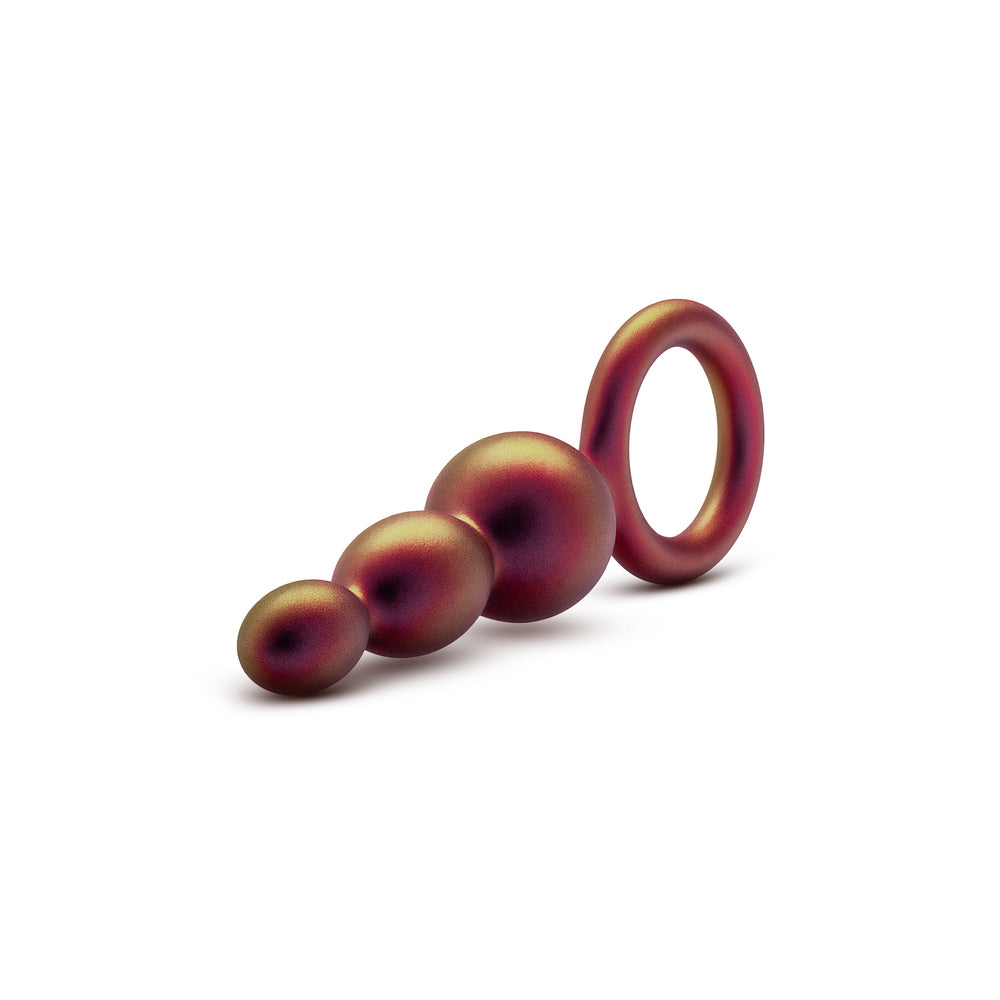 Set of three red rubber rings on a white background