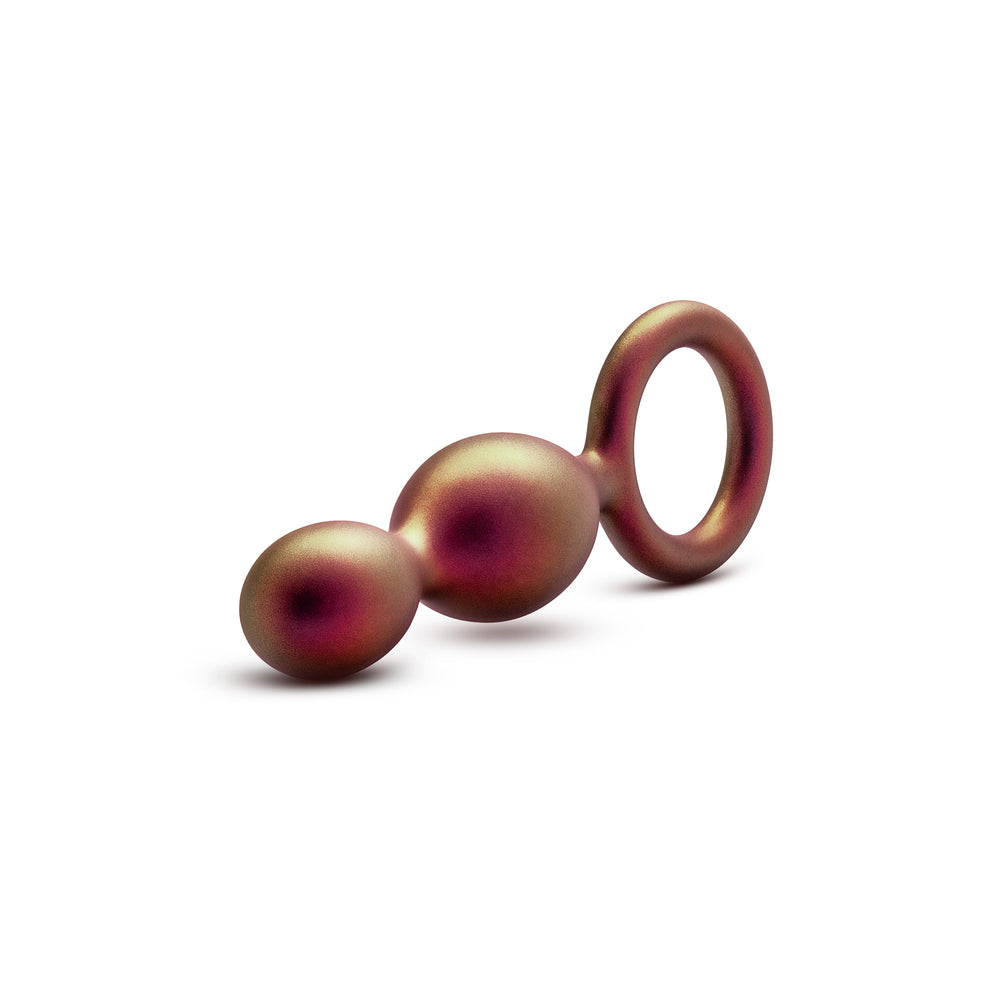 Three-dimensional object with spherical and ring-like shapes on a white background