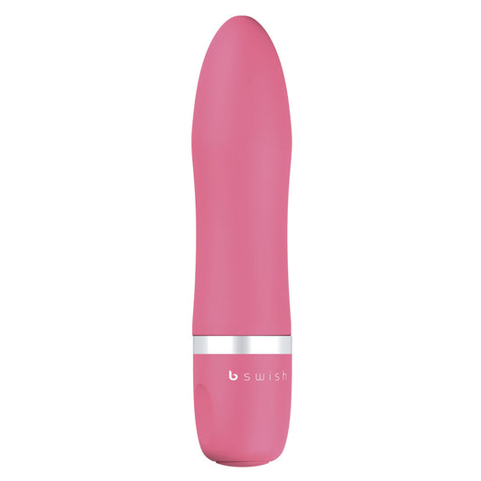 A pink, straight and tapered mini vibrator with a slightly softer tip, ridges for grip, and a silver band near the base. The brand 'bswish' is visible on the silver band.