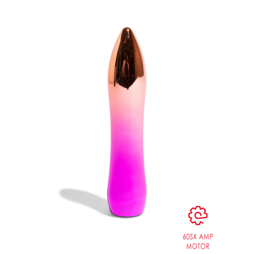 A hand holding a pink and metallic bullet vibrator.