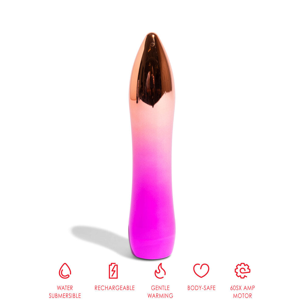 A hand holding a pink and metallic bullet vibrator.