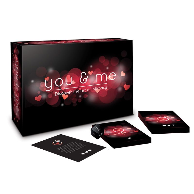 The product image shows the packaging of the "You and Me Game," which is designed with a purple background featuring hearts and text. The box contains various game cards, including 90 bedroom challenges, aimed at spicing up intimate moments.