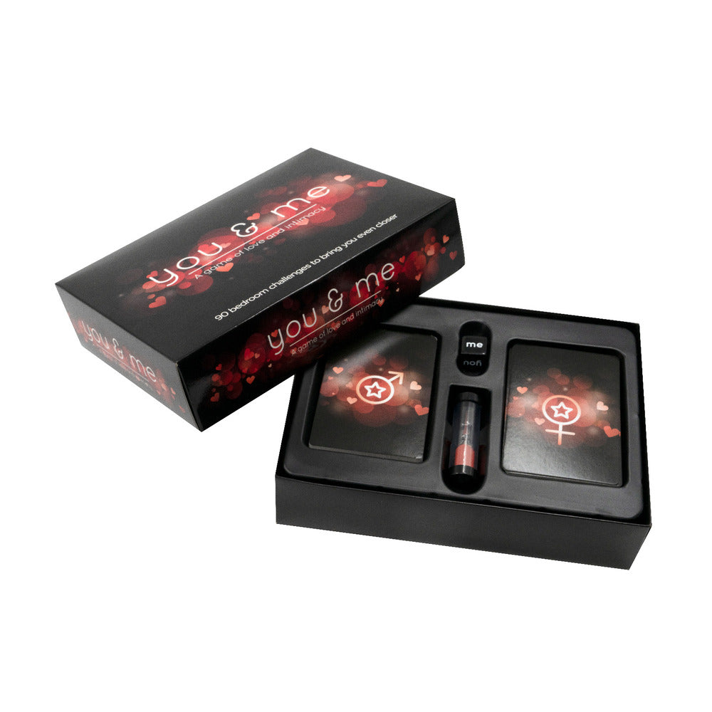 The product image shows the packaging of the "You and Me Game," which is designed with a purple background featuring hearts and text. The box contains various game cards, including 90 bedroom challenges, aimed at spicing up intimate moments.