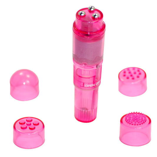A small pink vibrator with four different changeable heads, showing the device's multiple components laid out separately.