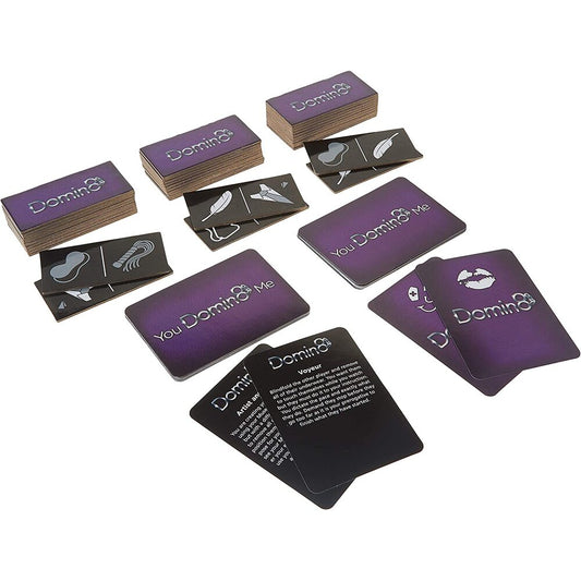 The image shows the board game Domin8, which includes a game box, domino-like cards, and scenario cards with a purple and black color scheme.