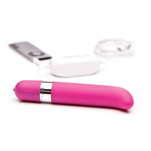 A pink, cylindrical vibrator with a curved design at the bottom, featuring a silver band with the OhMiBod brand logo.