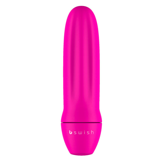 A pink, cylindrical mini vibrator with a smooth surface and the bswish brand logo near the base.