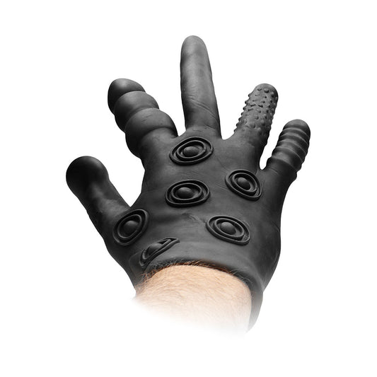 Black glove with textured design on a white background