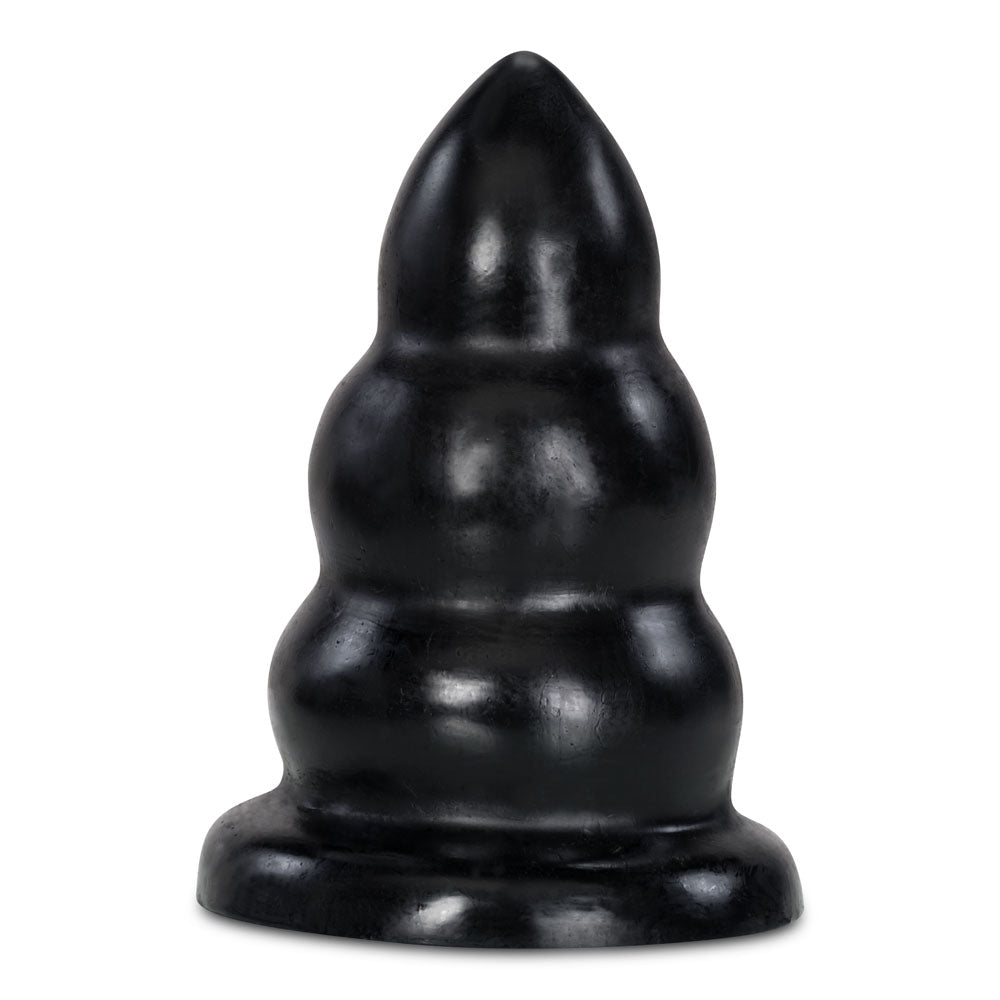 Black plastic object resembling a stylized female figure on a white background